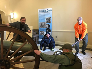 Installing Oyster Wars Cannon Exhibit