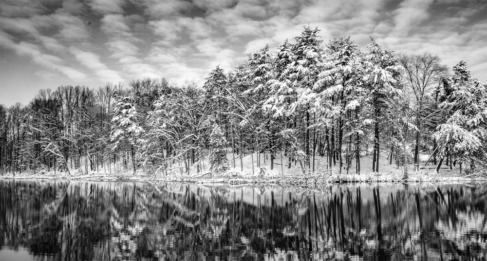 Winter snow scene, lake and trees