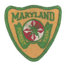 Hat patch, contemporary with left shoulder emblems of the Forest, Park & Wildlife Service, which included all forestry, parks and wildlife divisions (1984-1991)