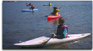 Kayakers exploring Tuckhoe Creek