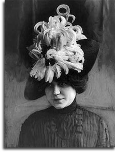 Woman in featheresd hat